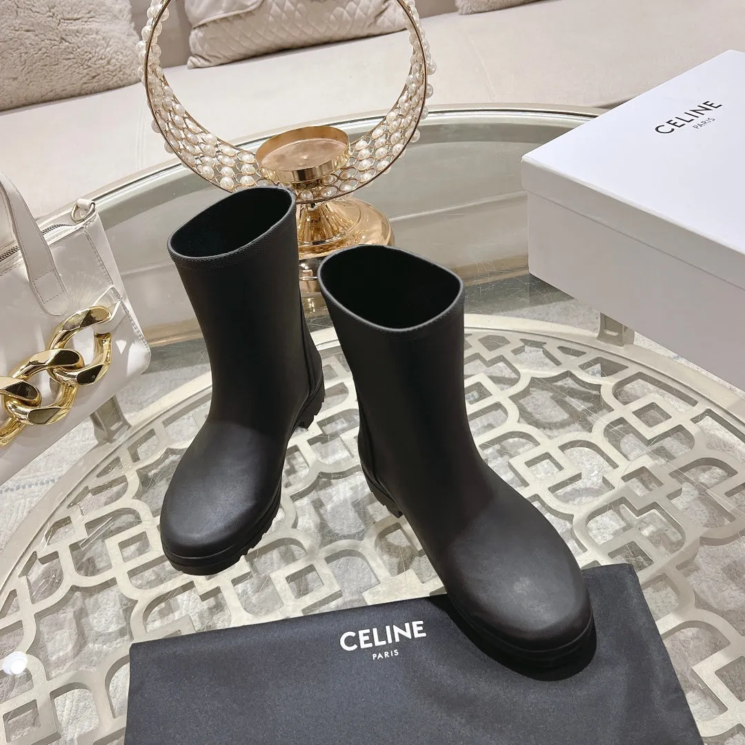 MID RAIN BOOTS IN BLACK NATURAL RUBBER